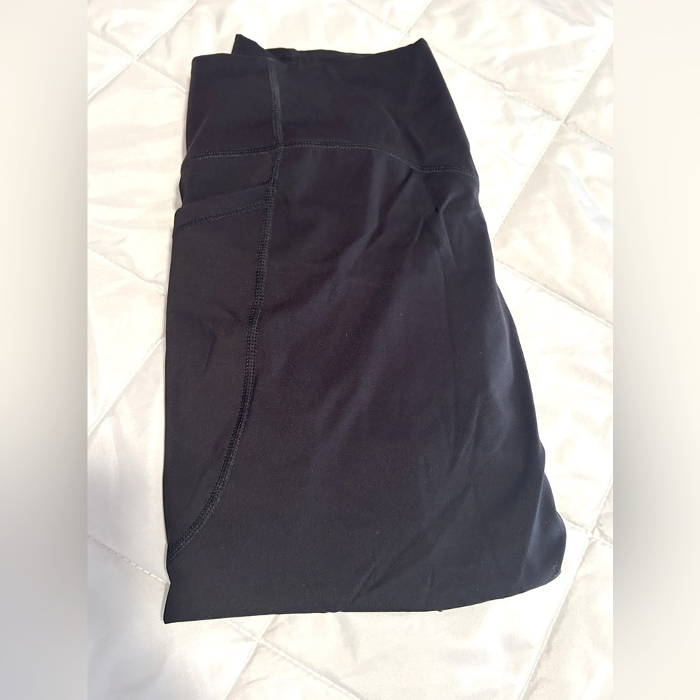 Halara High Waisted Side Pockets Shaping Training Leggings Full length.